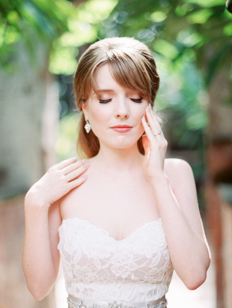 Allison's Bridals Bride touching face
