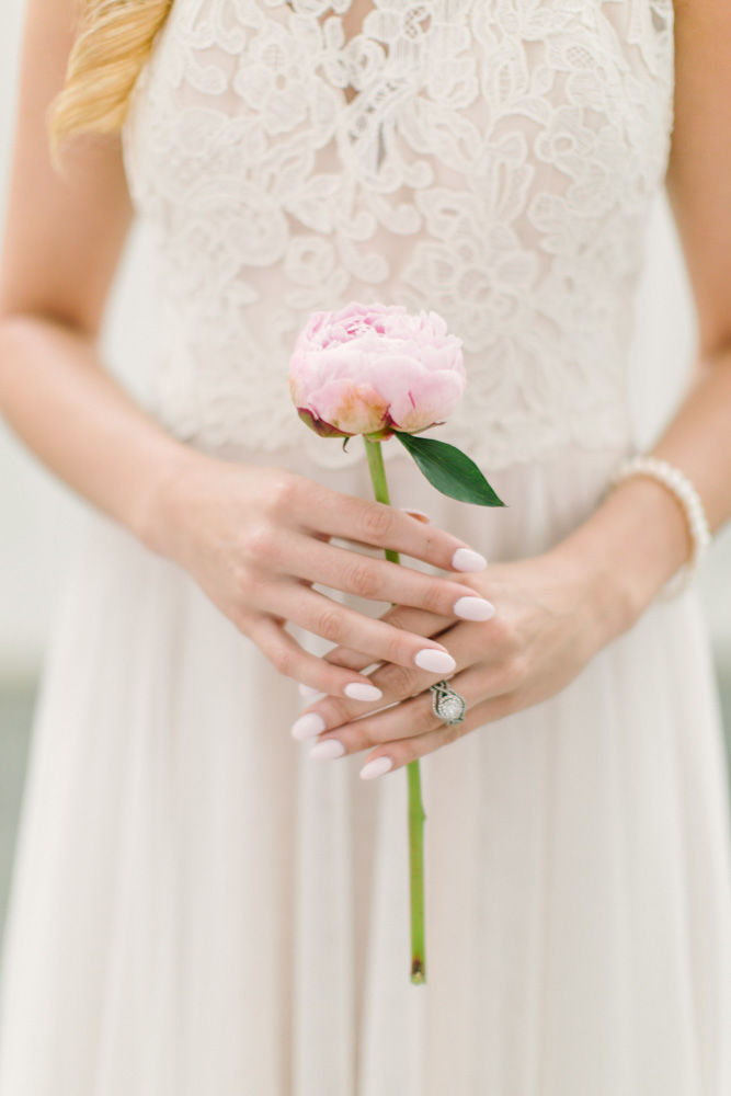 Spring Bridals at the Farmhouse Bride holding pink peony