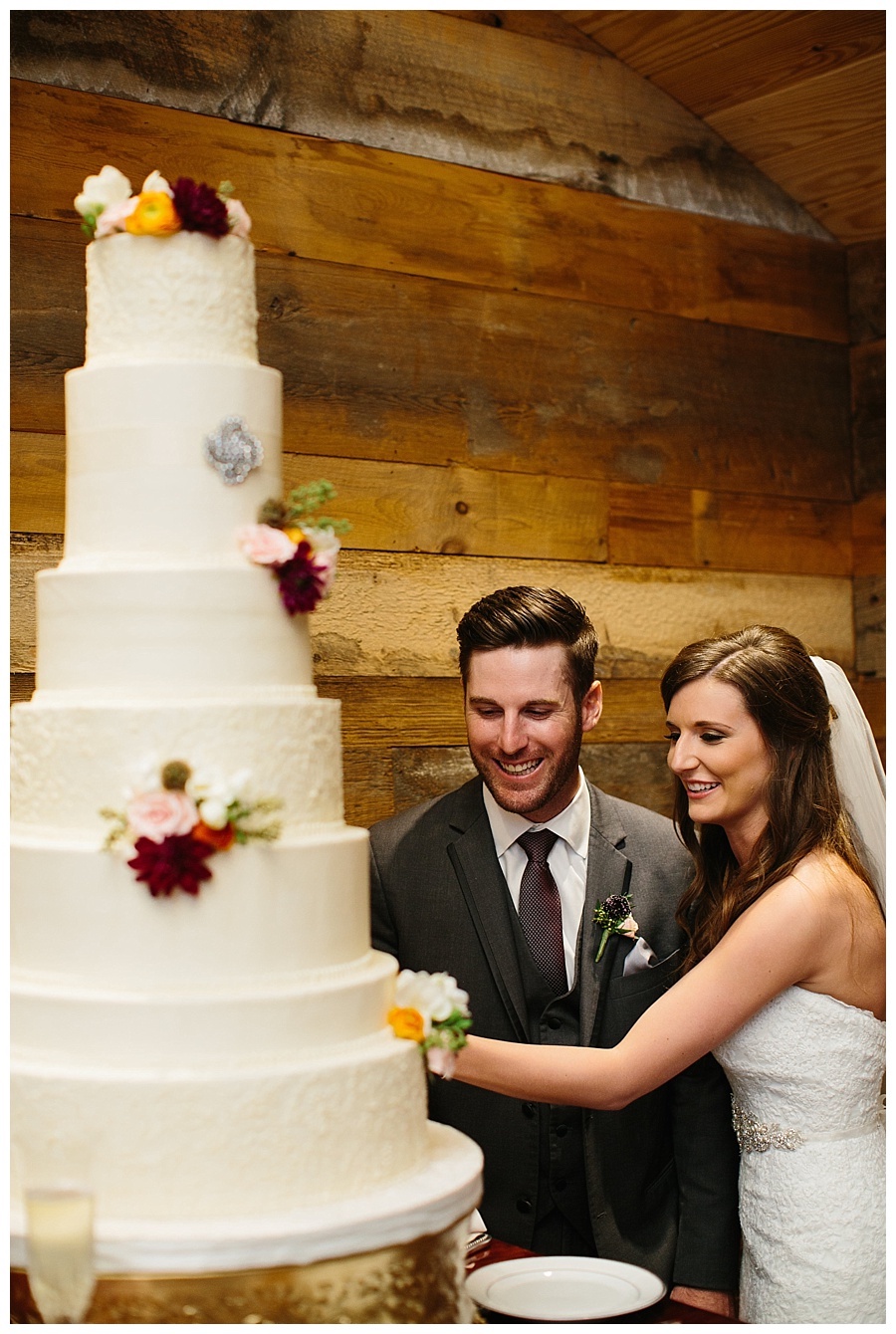 Elegant Hill Country Wedding  bride and groom cutting cake